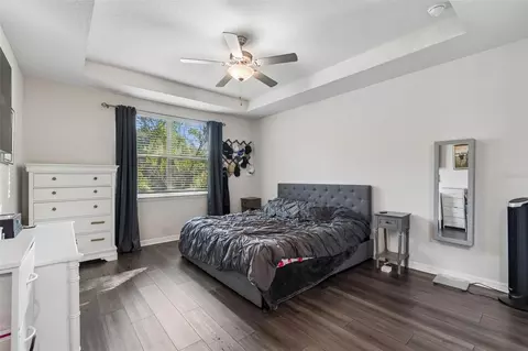 Bedroom - 7604 Pool Compass Loop, Wesley Chapel, FL 33545 photo 10 of 13