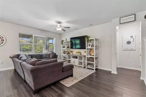 Living - 7604 Pool Compass Loop, Wesley Chapel, FL 33545 photo 2 of 3