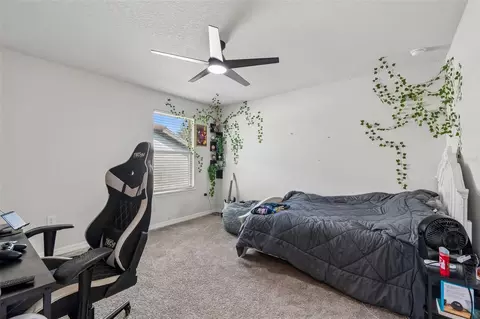 Bedroom - 7604 Pool Compass Loop, Wesley Chapel, FL 33545 photo 7 of 13