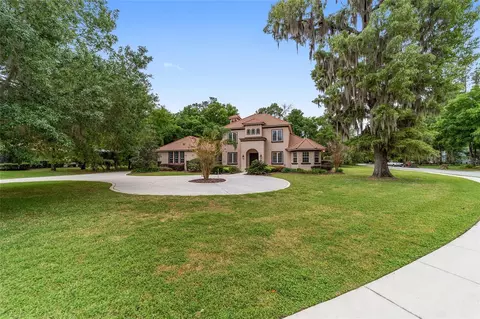 Exterior - 678 SE 47th Loop, Ocala, FL 34480 photo 2 of 13