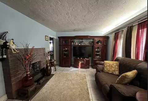 Living - 2131 NE 3rd St, Ocala, FL 34470 photo 1 of 1