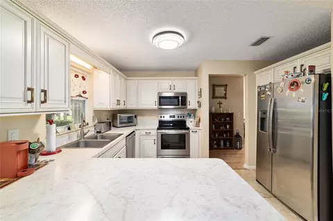 Kitchen - 9040 SW 87th Ave #C, Ocala, FL 34481 photo 3 of 6