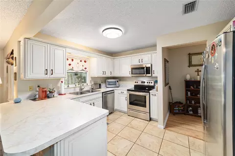Kitchen - 9040 SW 87th Ave #C, Ocala, FL 34481 photo 4 of 6