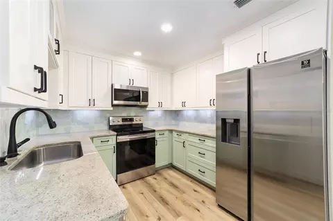 Kitchen - 825 SE 13th St, Ocala, FL 34471 photo 3 of 7