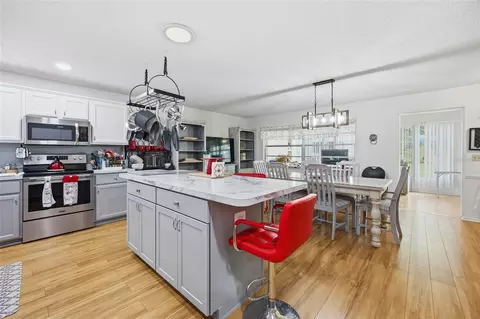 Kitchen - 9335 SW 85th Ter #E, Ocala, FL 34481 photo 3 of 10