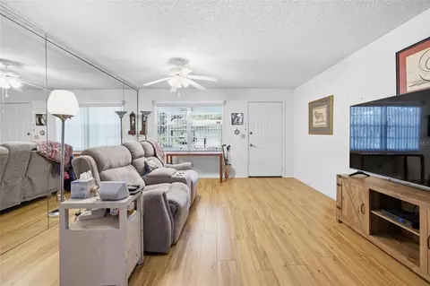 Living - 9335 SW 85th Ter #E, Ocala, FL 34481 photo 2 of 3