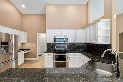 Kitchen - 5610 SW 88th Pl, Ocala, FL 34476 photo 7 of 9