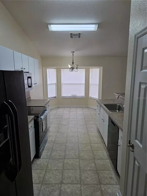 Kitchen - 5704 Pecan Rd, Ocala, FL 34472 photo 2 of 4