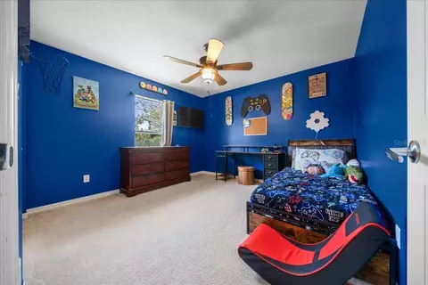 Bedroom - 5321 SW 115th Loop, Ocala, FL 34476 photo 3 of 7