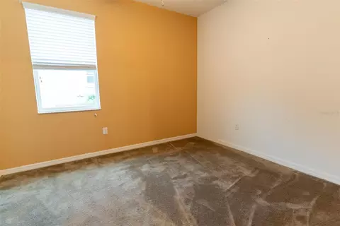 Bedroom - 10067 SW 89th Loop, Ocala, FL 34481 photo 9 of 13