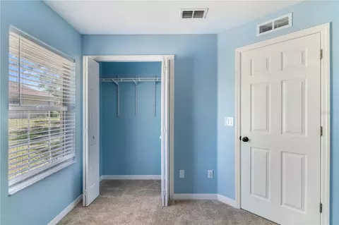 Bedroom - 5395 SW 103rd Loop, Ocala, FL 34476 photo 3 of 6