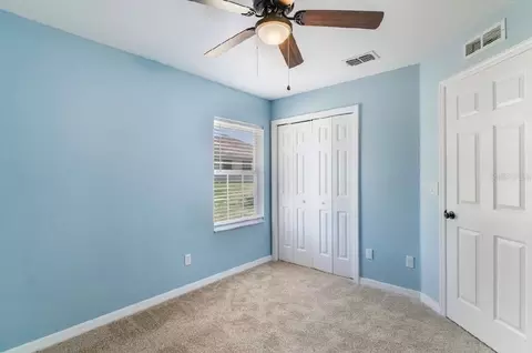 Bedroom - 5395 SW 103rd Loop, Ocala, FL 34476 photo 2 of 6