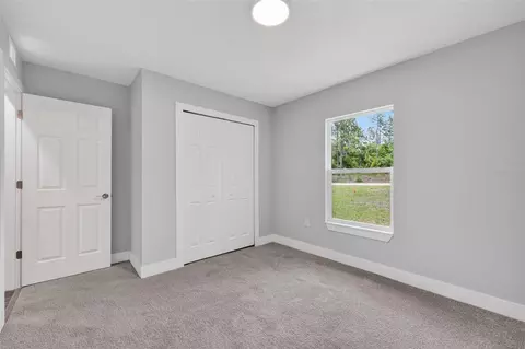 Bedroom - 1451 SW 153rd Ct, Ocala, FL 34481 photo 6 of 9