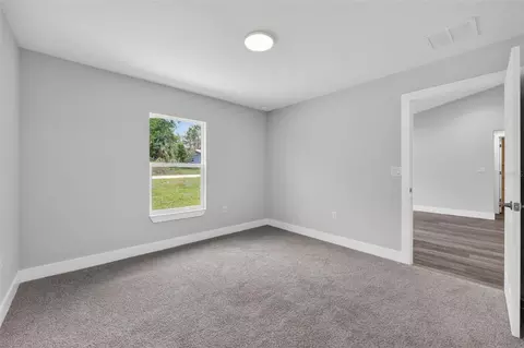 Bedroom - 1451 SW 153rd Ct, Ocala, FL 34481 photo 3 of 9