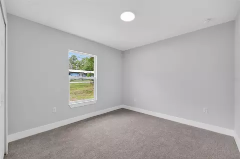 Bedroom - 1451 SW 153rd Ct, Ocala, FL 34481 photo 4 of 9