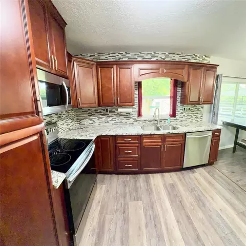 Kitchen - 428 NE 21st Ter, Ocala, FL 34470 photo 1 of 2