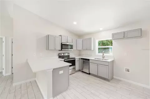 Kitchen - 94 Dogwood Drive Loop, Ocala, FL 34472 photo 2 of 3