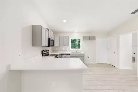 Kitchen - 94 Dogwood Drive Loop, Ocala, FL 34472 photo 3 of 3