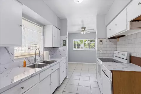 Kitchen - 998 W 68th St, Hialeah, FL 33014 photo 2 of 2