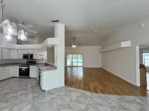 Living - 7558 SW 103rd Loop, Ocala, FL 34476 photo 1 of 6