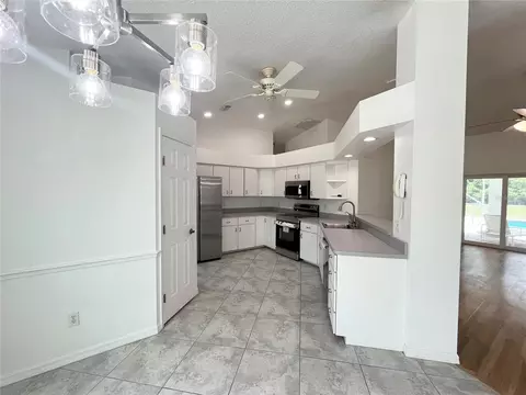 Kitchen - 7558 SW 103rd Loop, Ocala, FL 34476 photo 3 of 4
