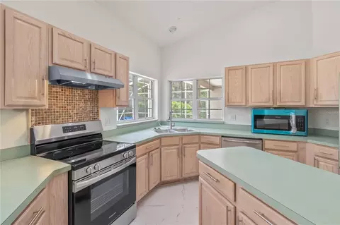 Kitchen - 7649 SW 103rd Loop, Ocala, FL 34476 photo 3 of 5