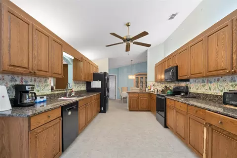 Kitchen - 9921 SE 138th Loop, Summerfield, FL 34491 photo 1 of 4