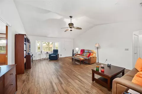 Living - 8560 SW 90th St #E, Ocala, FL 34481 photo 3 of 4