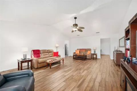 Living - 8560 SW 90th St #E, Ocala, FL 34481 photo 1 of 4