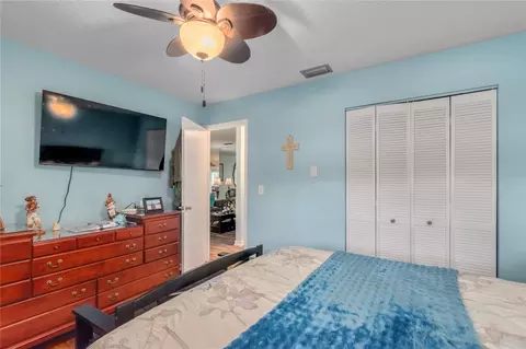 Bedroom - 8876 SW 95th Ln #E, Ocala, FL 34481 photo 2 of 3