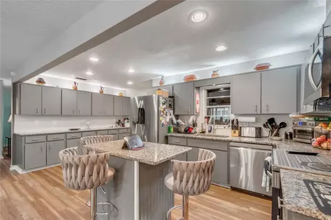 Kitchen - 8876 SW 95th Ln #E, Ocala, FL 34481 photo 4 of 6