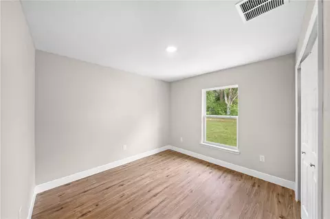 Bedroom - 6026 NW 65th St, Ocala, FL 34482 photo 2 of 7