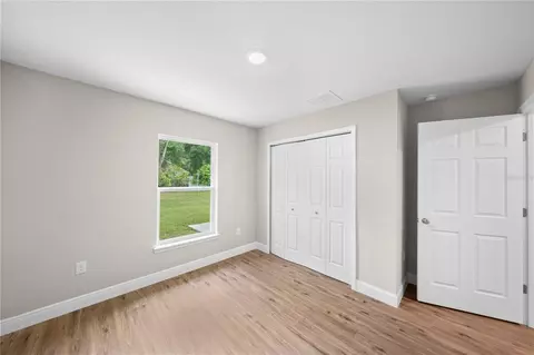 Bedroom - 6026 NW 65th St, Ocala, FL 34482 photo 5 of 7
