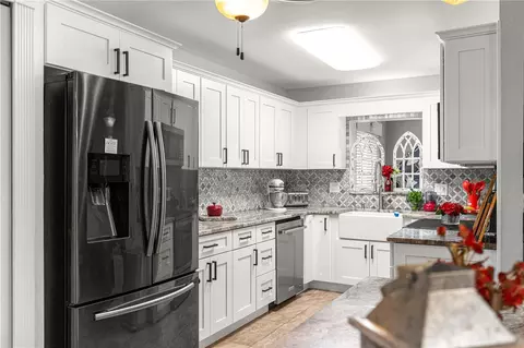 Kitchen - 8874 SW 95th St #E, Ocala, FL 34481 photo 5 of 6