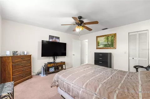 Bedroom - 8874 SW 95th St #E, Ocala, FL 34481 photo 5 of 7