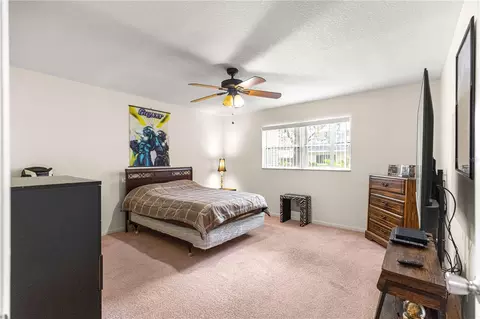 Bedroom - 8874 SW 95th St #E, Ocala, FL 34481 photo 4 of 7