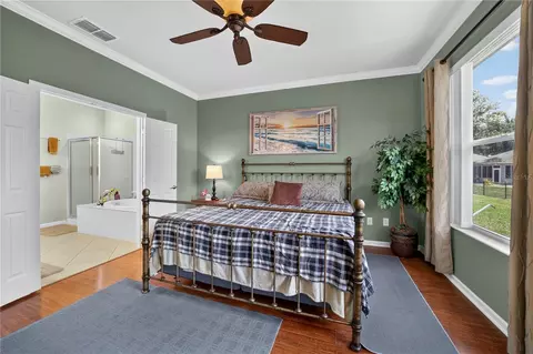 Bedroom - 9824 SW 72nd Ln, Ocala, FL 34481 photo 2 of 4