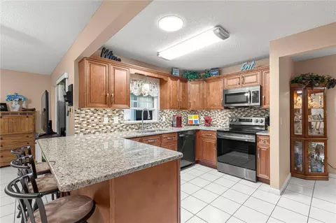 Kitchen - 9256 SW 82nd Ter #E, Ocala, FL 34481 photo 2 of 4