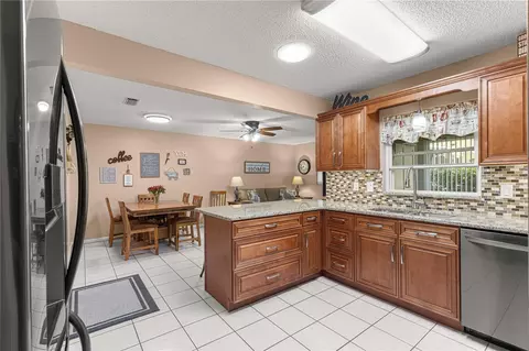 Kitchen - 9256 SW 82nd Ter #E, Ocala, FL 34481 photo 3 of 4