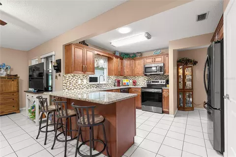 Kitchen - 9256 SW 82nd Ter #E, Ocala, FL 34481 photo 1 of 4