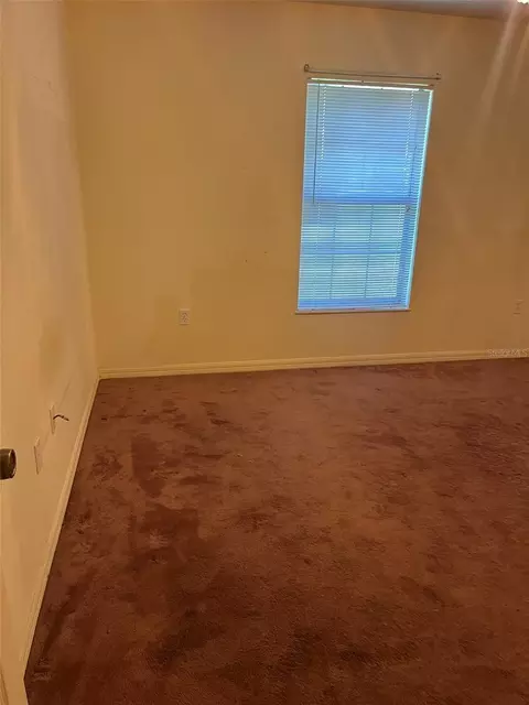 Bedroom - 8451 SW 14th Ln, Okeechobee, FL 34974 photo 6 of 7