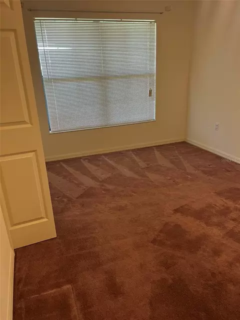 Bedroom - 8451 SW 14th Ln, Okeechobee, FL 34974 photo 2 of 7