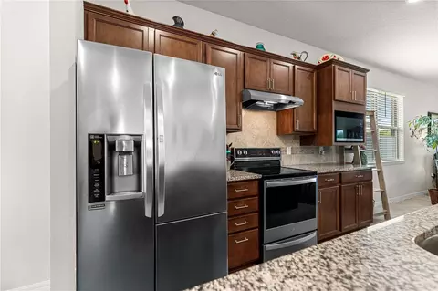 Kitchen - 9725 SW 63rd Loop, Ocala, FL 34481 photo 3 of 6