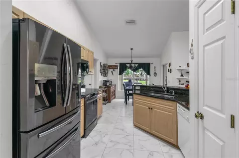Kitchen - 5292 SW 115th Loop, Ocala, FL 34476 photo 2 of 2