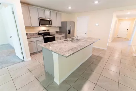 Kitchen - 6747 SE 3rd Loop, Ocala, FL 34472 photo 3 of 9