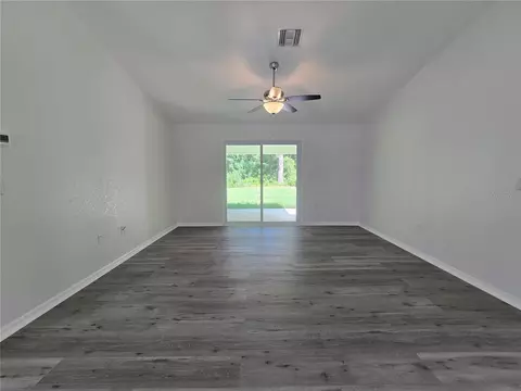 Living - 11 Sequoia Loop Pl, Ocklawaha, FL 32179 photo 3 of 7