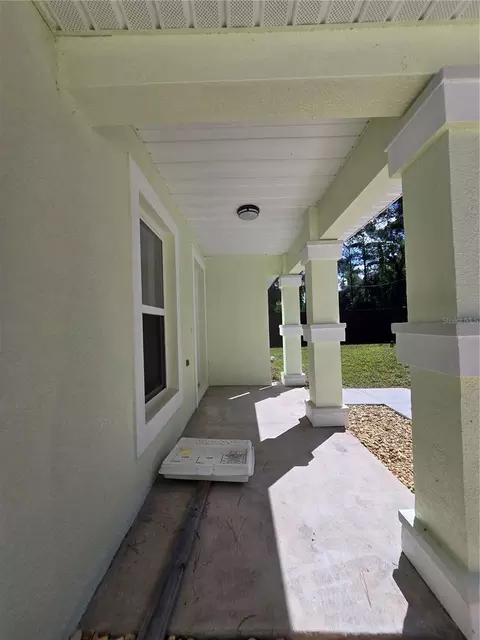 Exterior - 11 Sequoia Loop Pl, Ocklawaha, FL 32179 photo 9 of 11