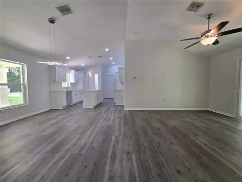 Living - 11 Sequoia Loop Pl, Ocklawaha, FL 32179 photo 5 of 7