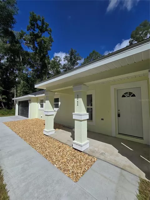 Exterior - 11 Sequoia Loop Pl, Ocklawaha, FL 32179 photo 6 of 11