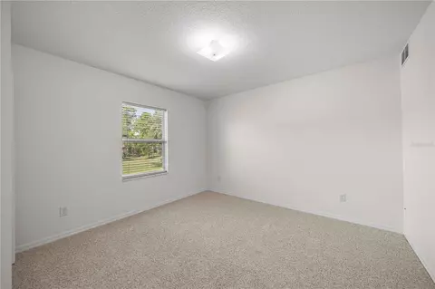 Bedroom - 4949 SW 109th Loop, Ocala, FL 34476 photo 5 of 8